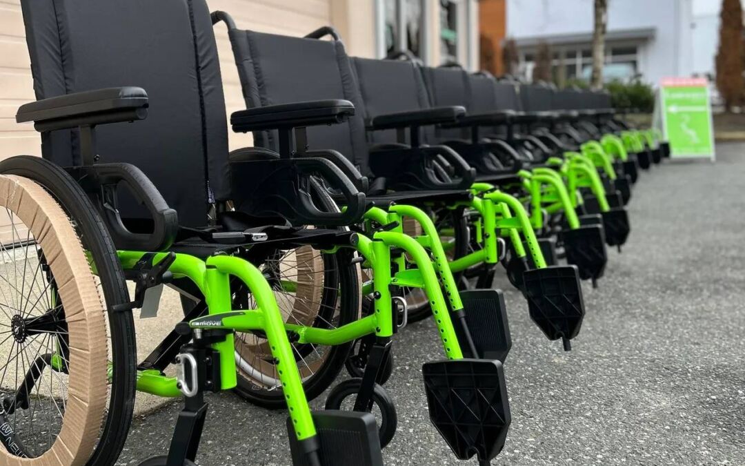 A Fleet of Acid Green MOVE Wheelchairs ready for delivery.