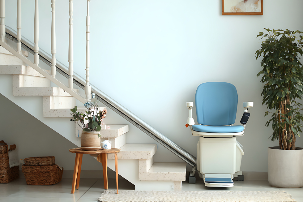 Modern straight residential stairlift installed along a staircase in a bright home for safe and independent indoor mobility.